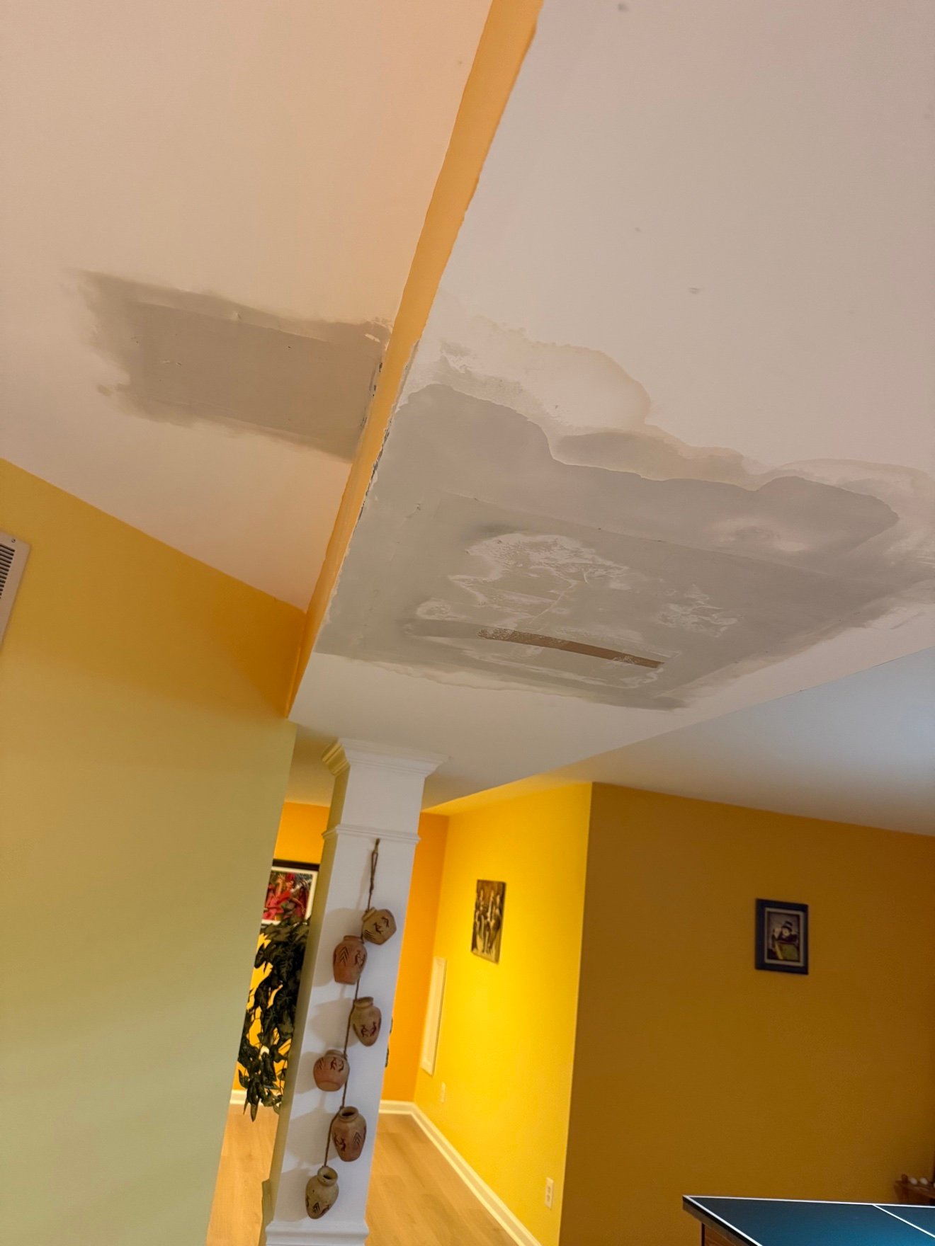 Ceiling holes patched with fresh joint compound