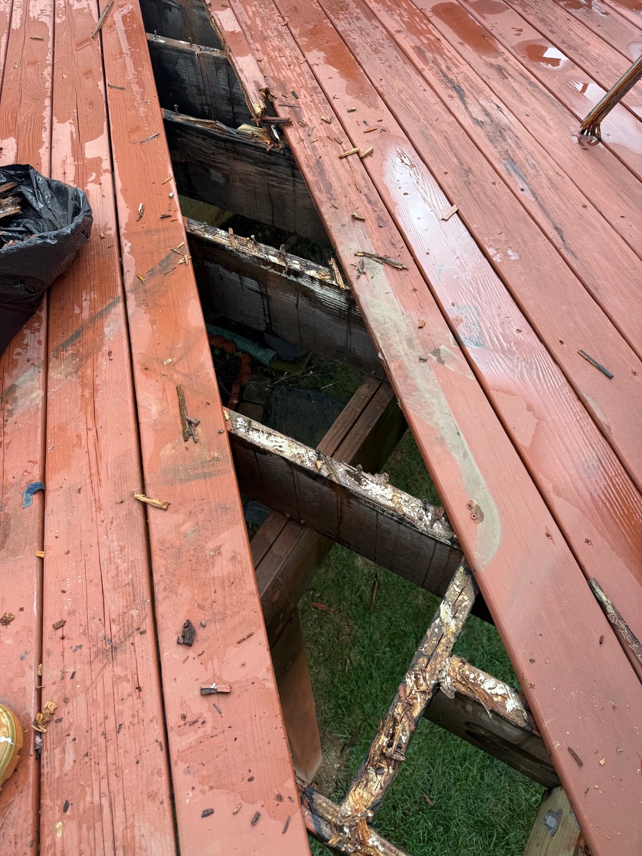Rotted deck joists before repair