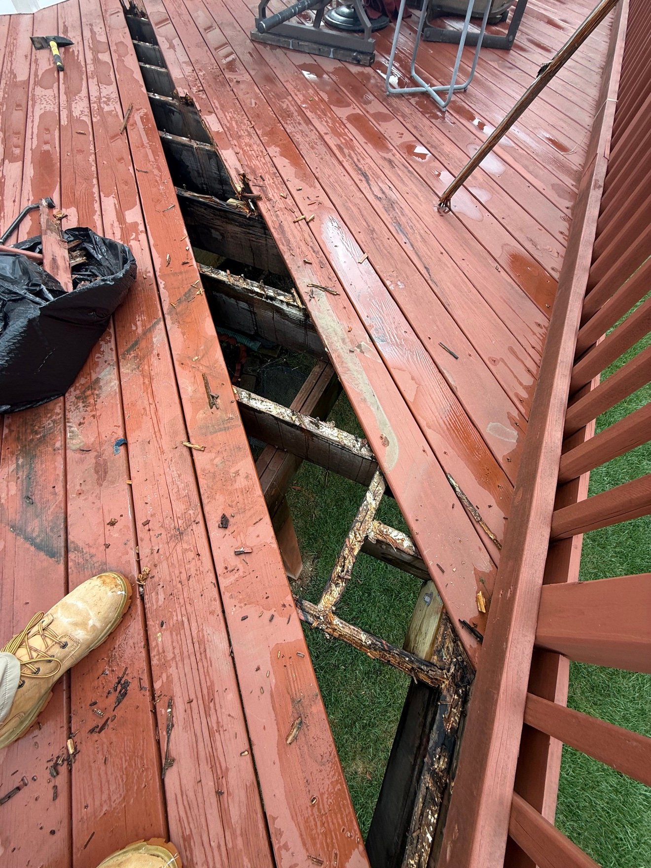 Deck boards removed, damaged structure