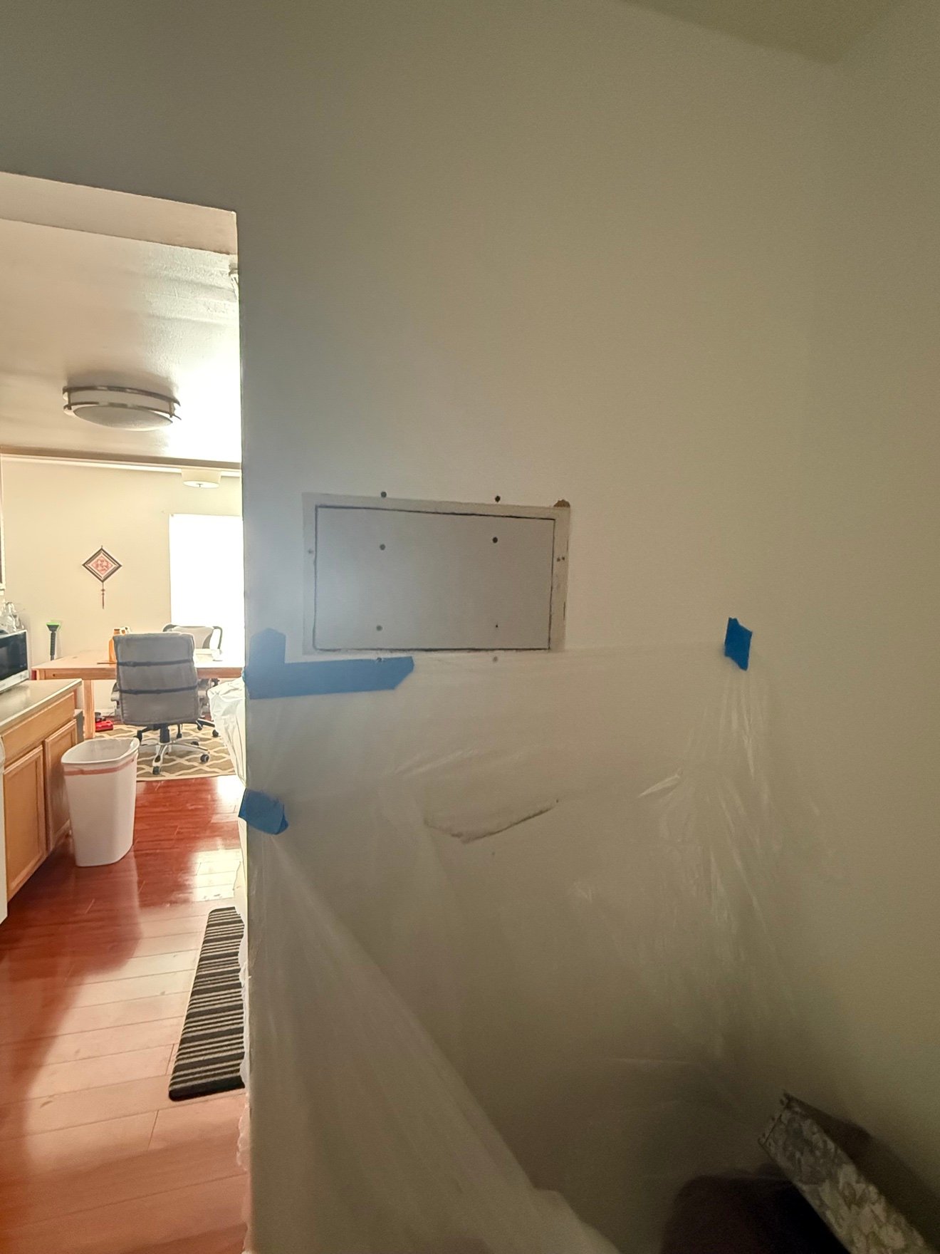 Drywall access panel secured with screws