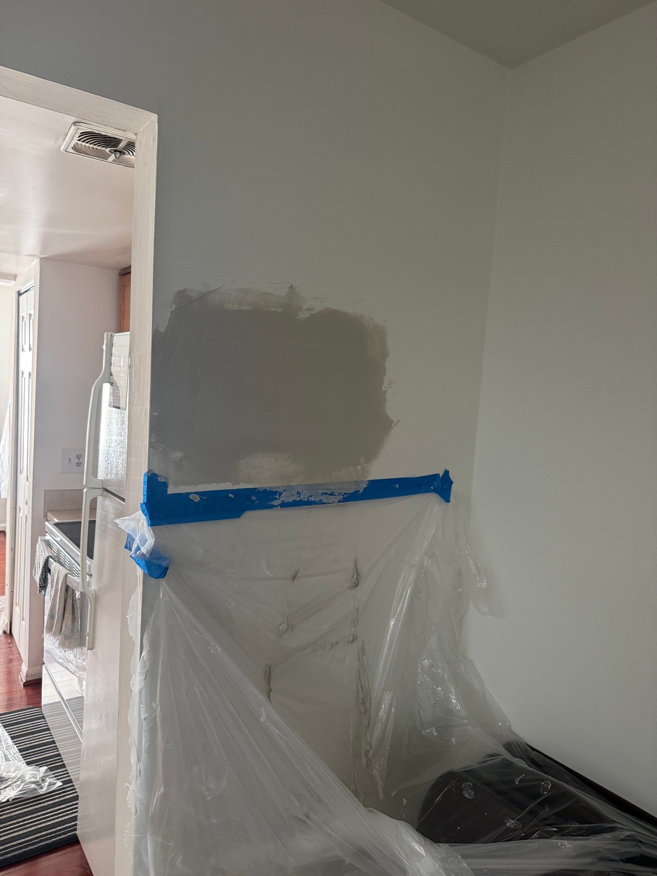 Large wall patch with joint compound applied