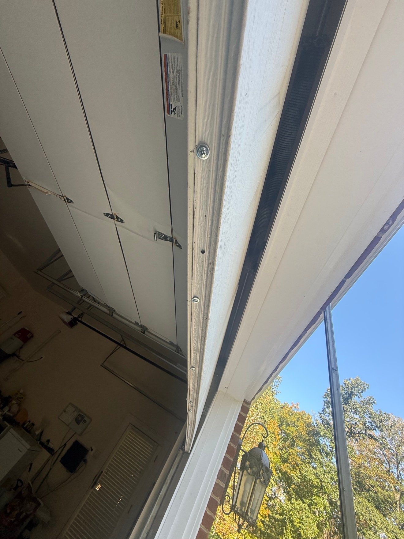 New garage door weatherstripping installed