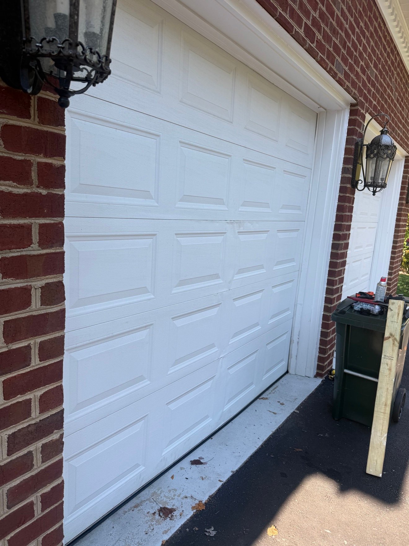 Garage door repaired and closing smoothly