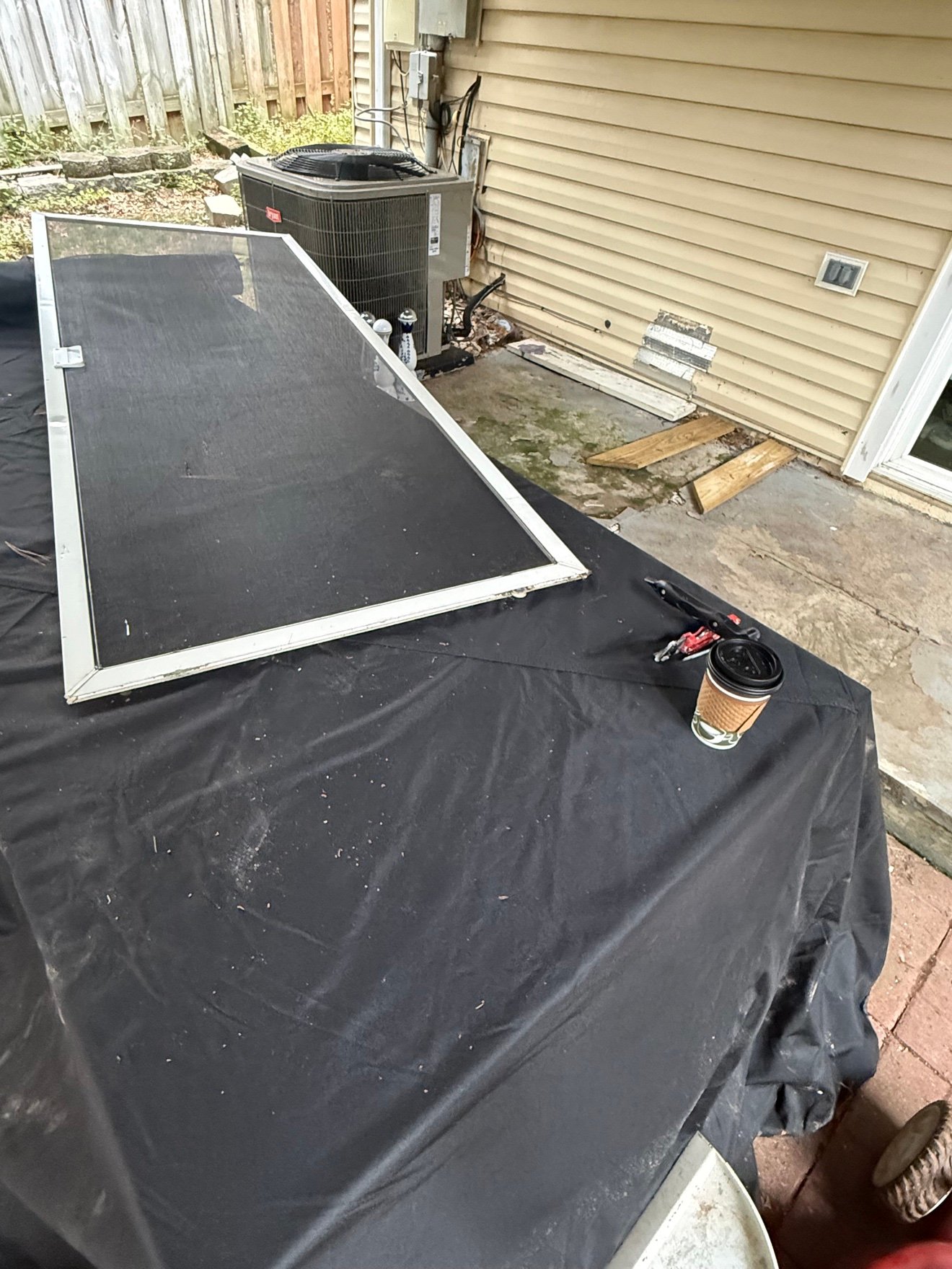 Window screen repair in progress