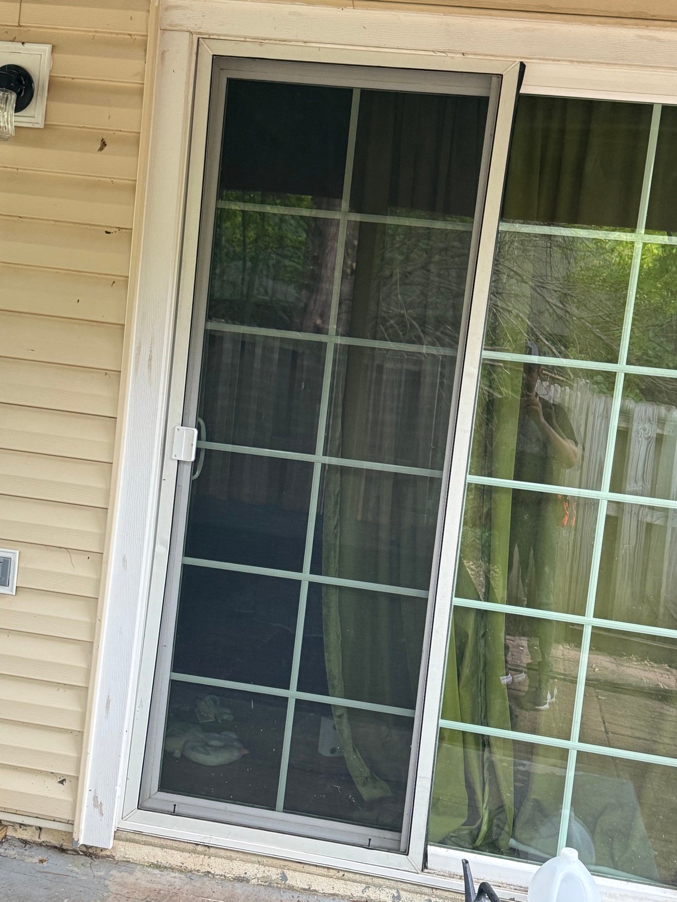 Sliding glass door after screen service