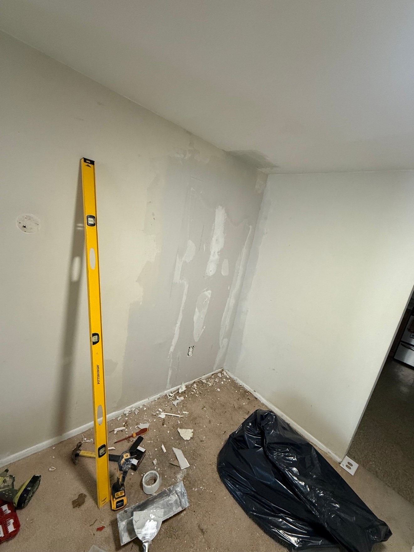 Drywall repair in progress