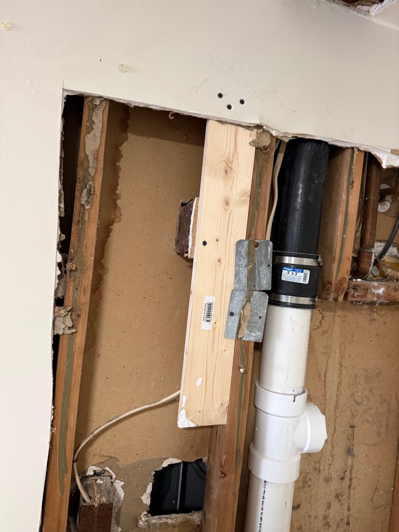 New PVC drain section joined with coupling