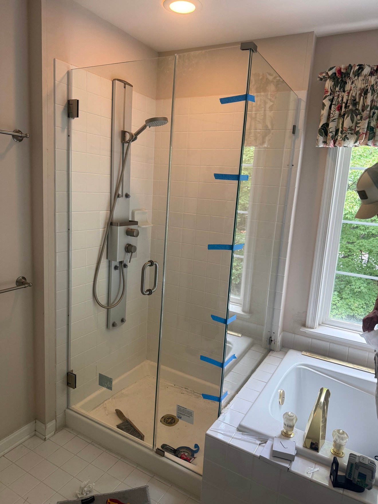 New frameless glass shower enclosure