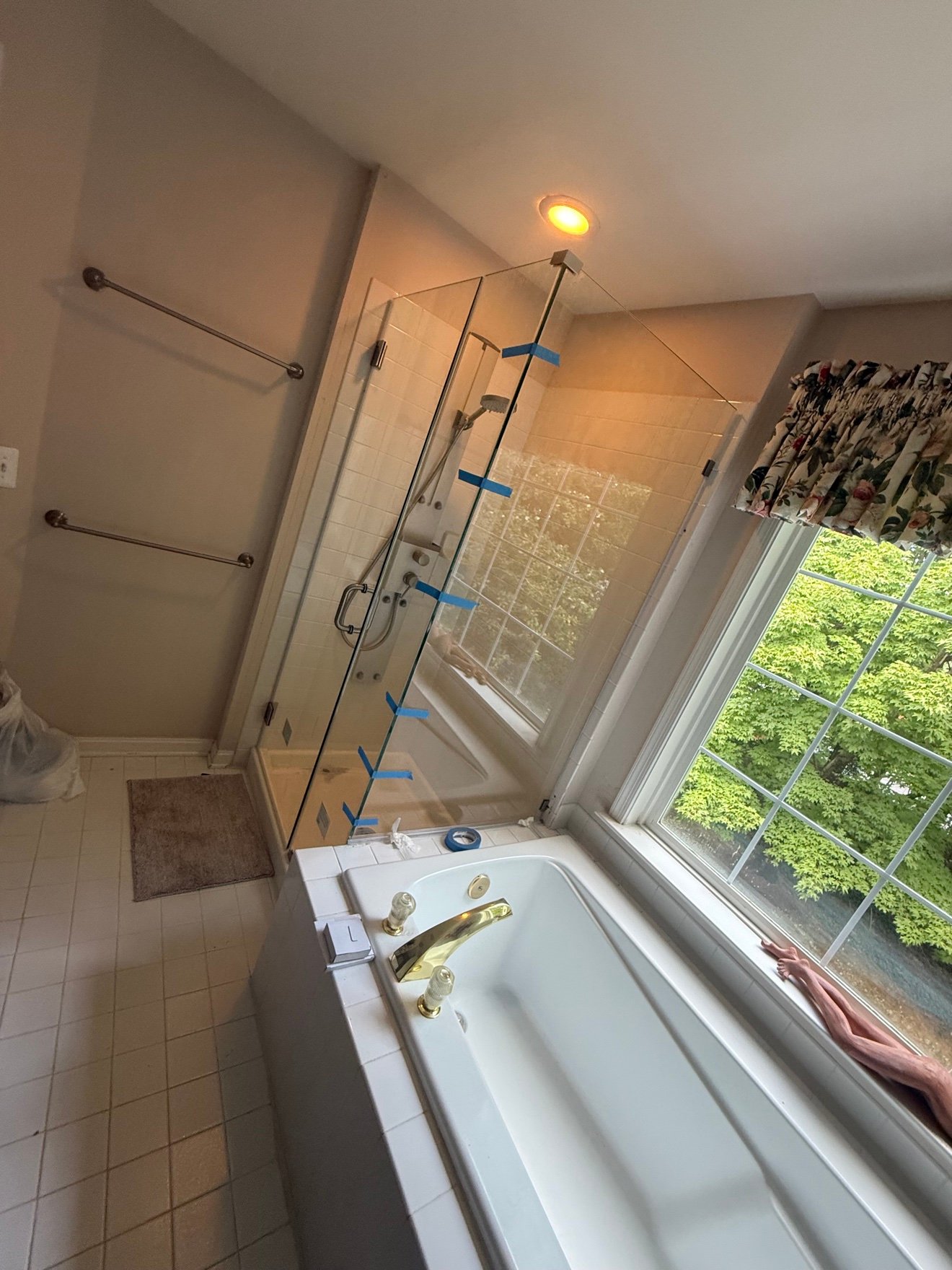 Installed glass shower door