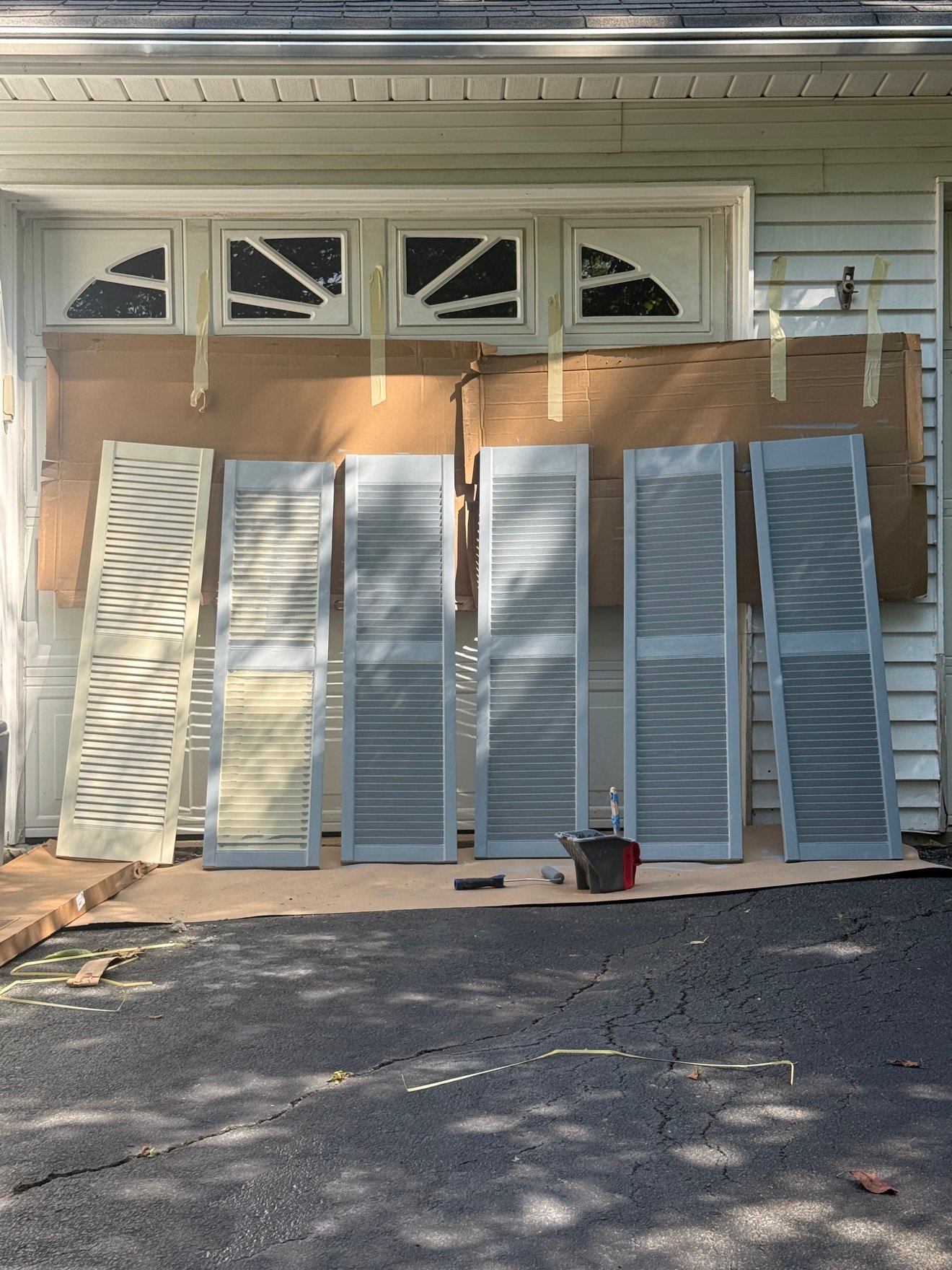 Shutters being painted