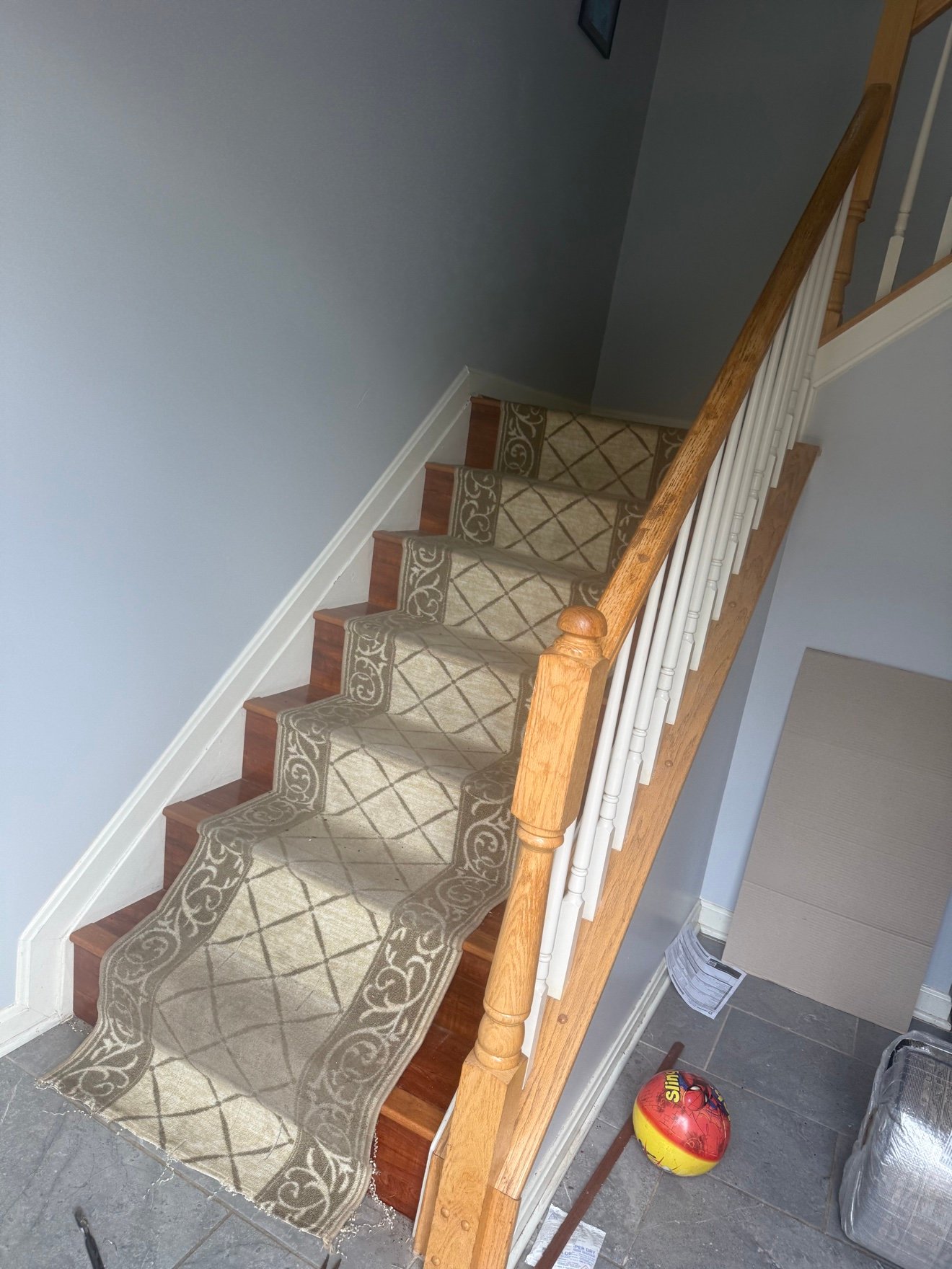 Old worn stair runner before replacement