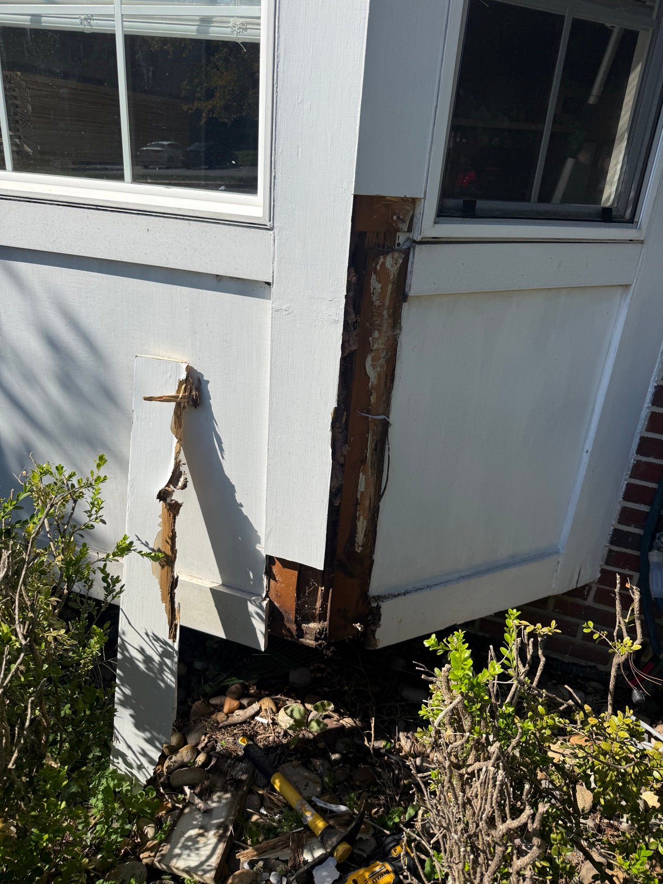 Rotted window trim before repair